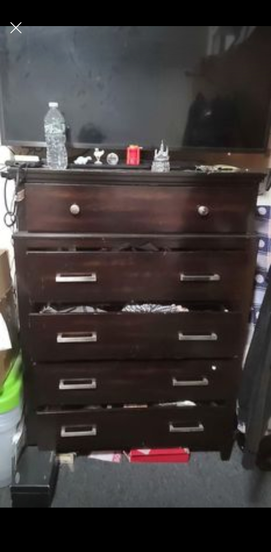 Wooden polished dresser neat and clean