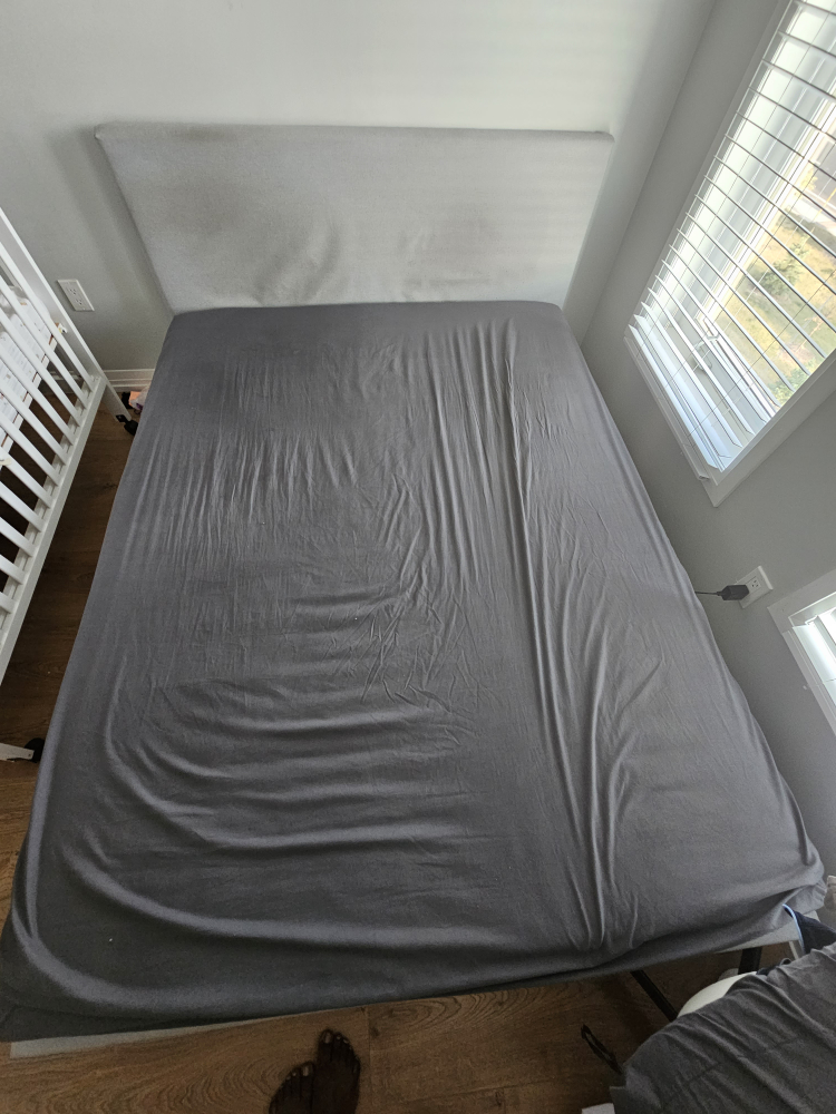 Grey queen size bed and mattress
