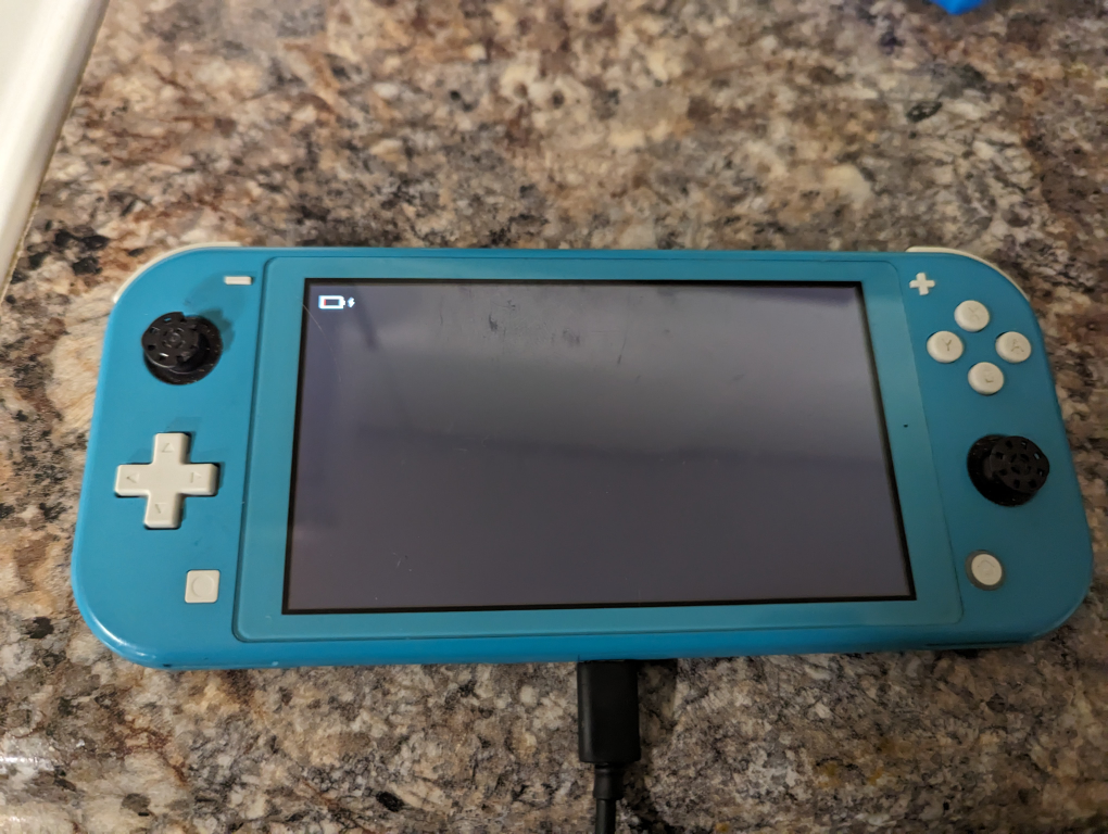 Nintendo Switch Lite and 200gb SD card - photo 2