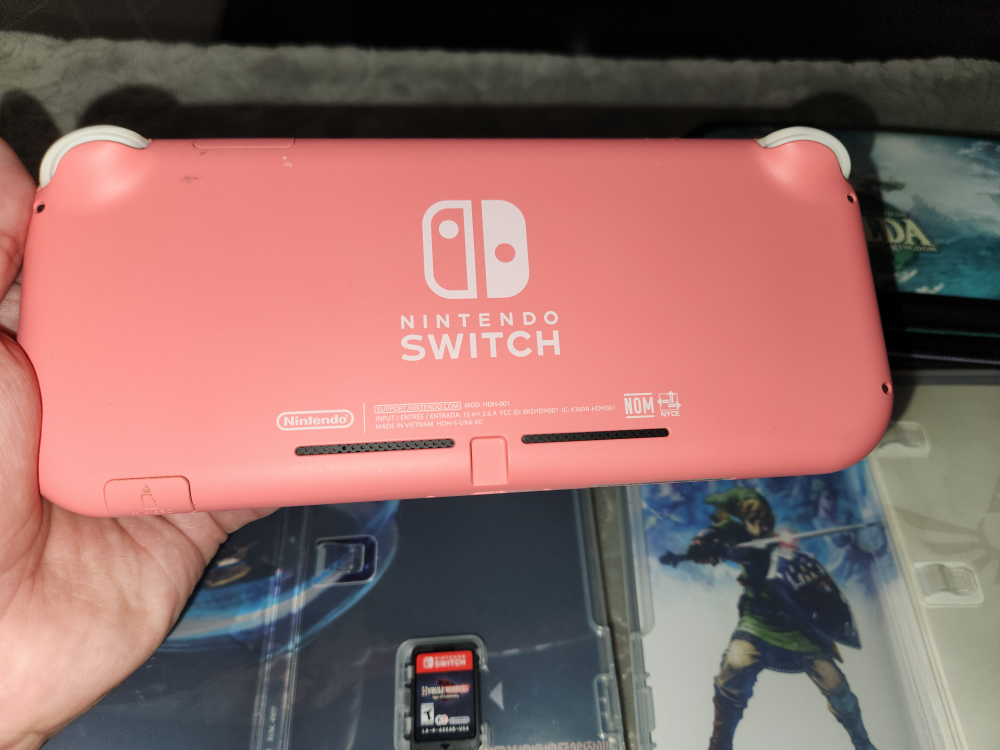 Switch lite Coral Bundle with 3 games - photo 2