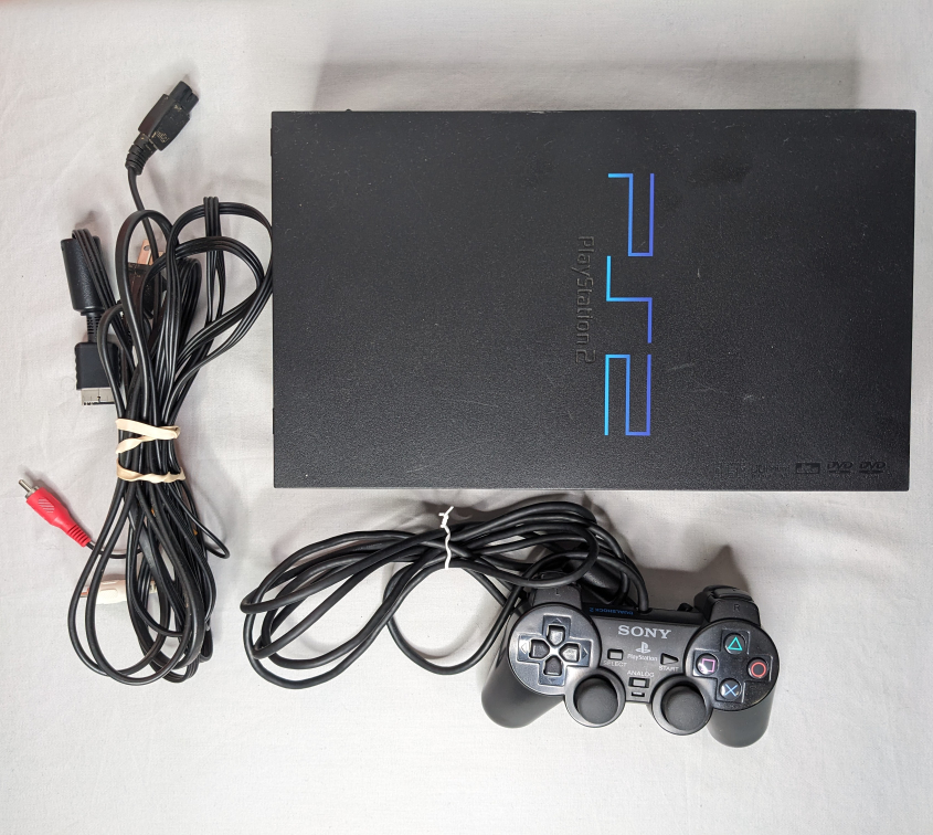 PlayStation 2 Fat with cables and controller thumbnail