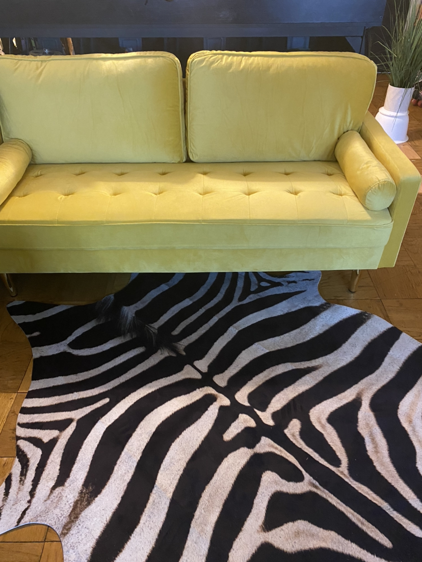 Modern yellow sofa comfortablely seats 3 new never used.