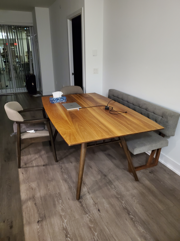 selling wood dining table and two chairs for $200