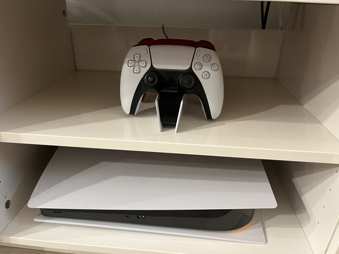 PS5 with 2 controllers and stand