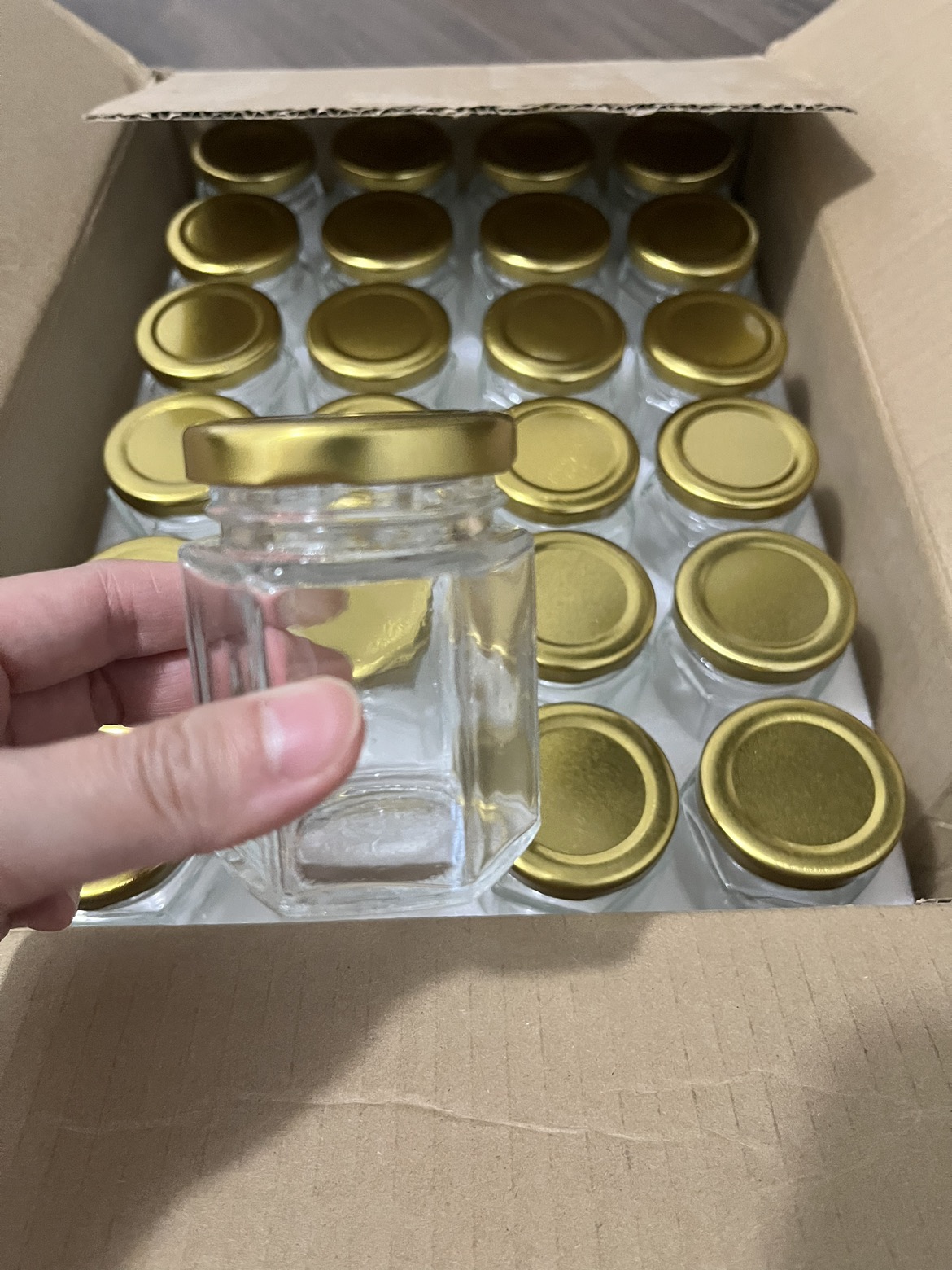24 hexagon mini glass jars with gold caps (lug neck finish) thumbnail