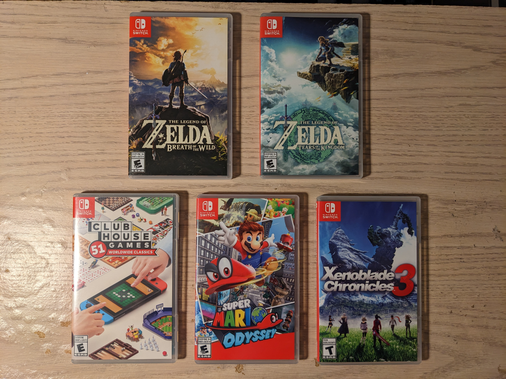 nintendo switch oled with games in good condition