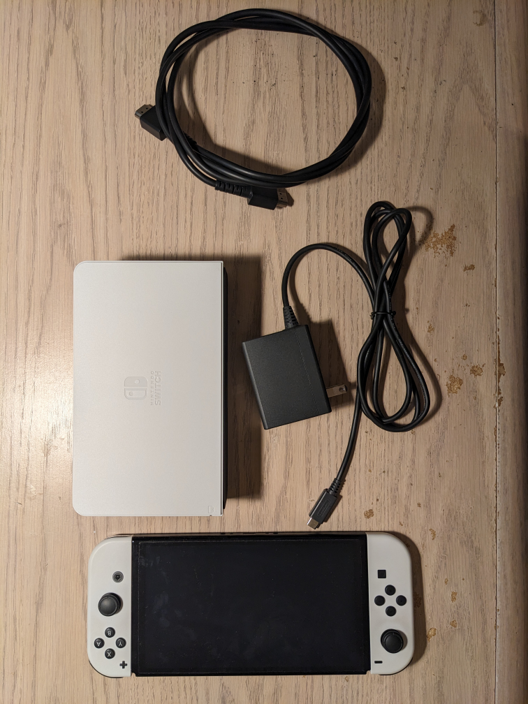 nintendo switch oled with games in good condition - photo 2