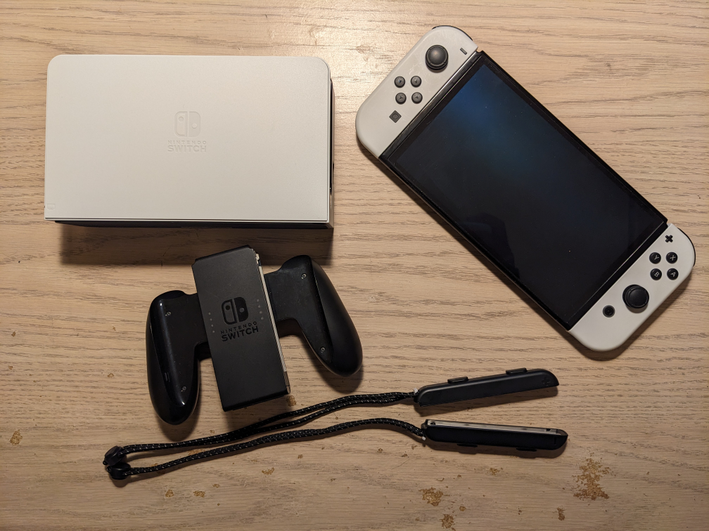 nintendo switch oled with games in good condition - photo 4