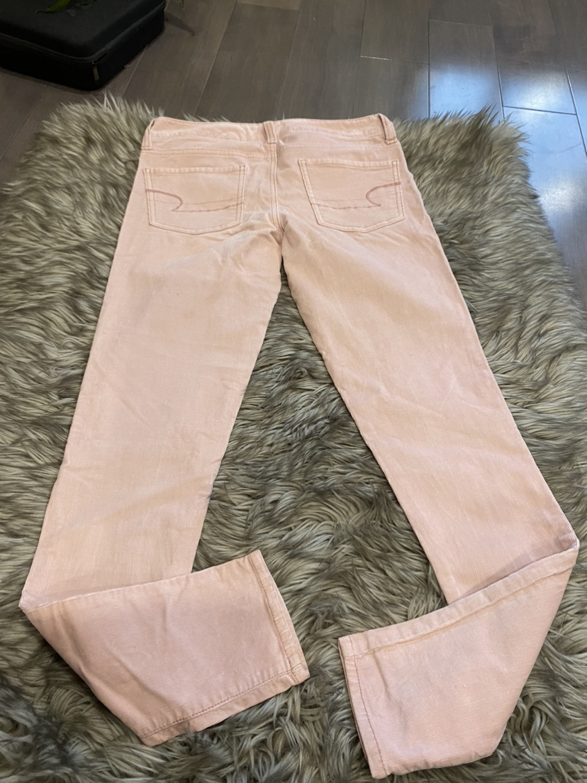Pink corduroy pants. image indicator(7)