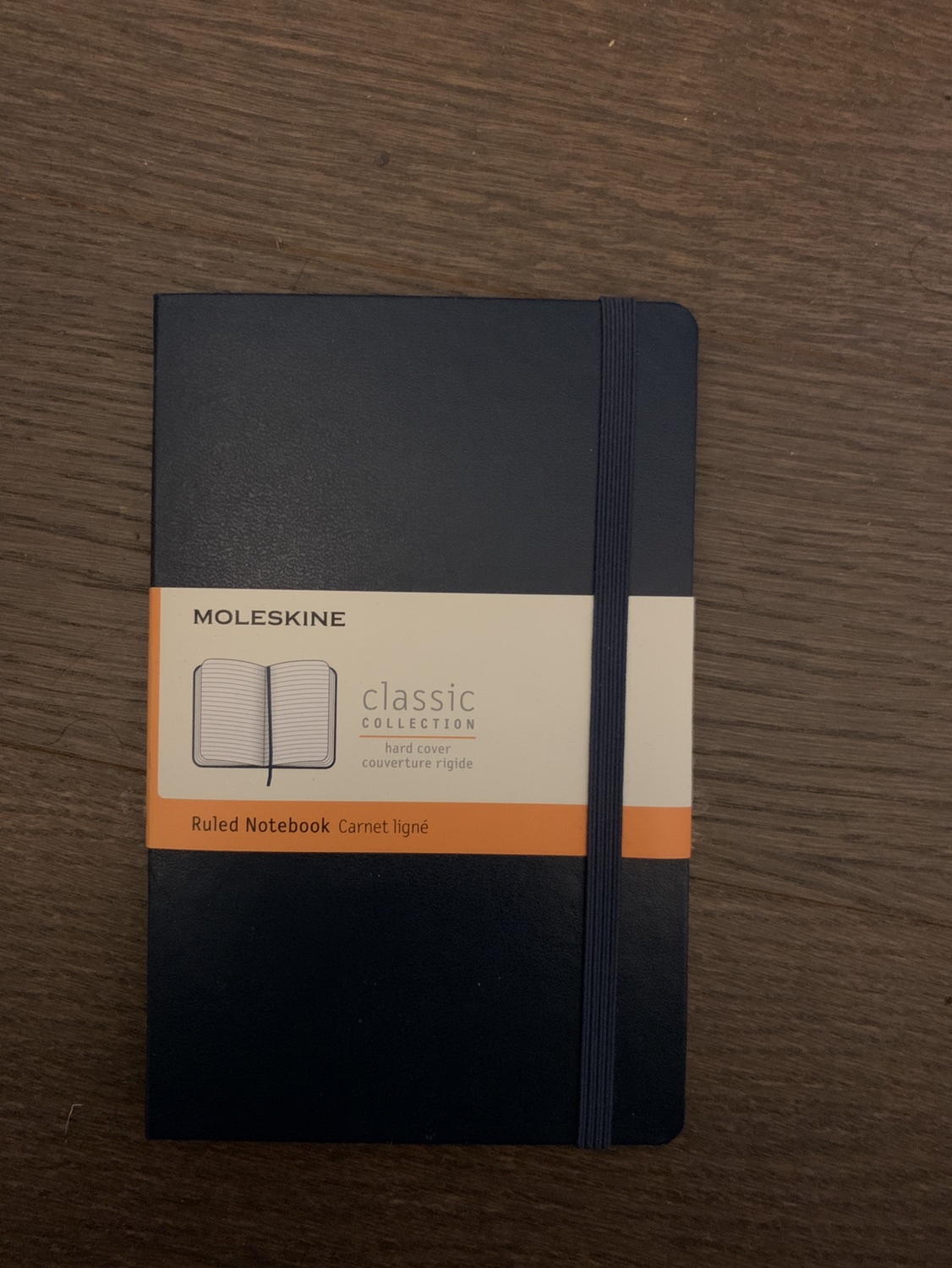 $10 - Moleskine hard cover notebook / journal