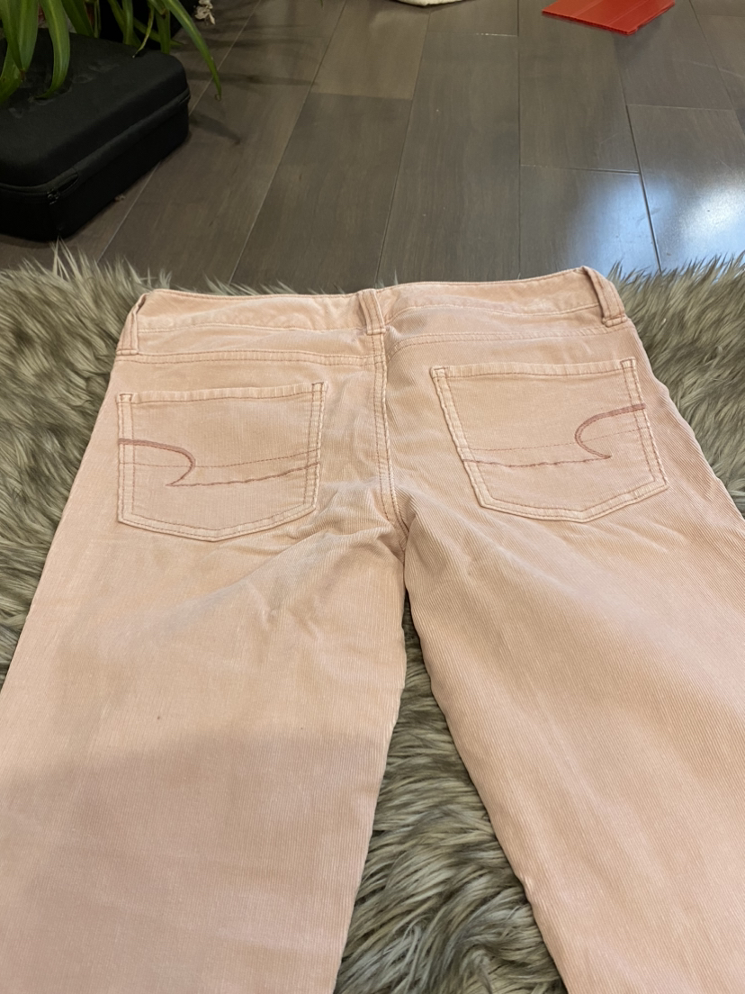 Pink corduroy pants. image indicator(6)