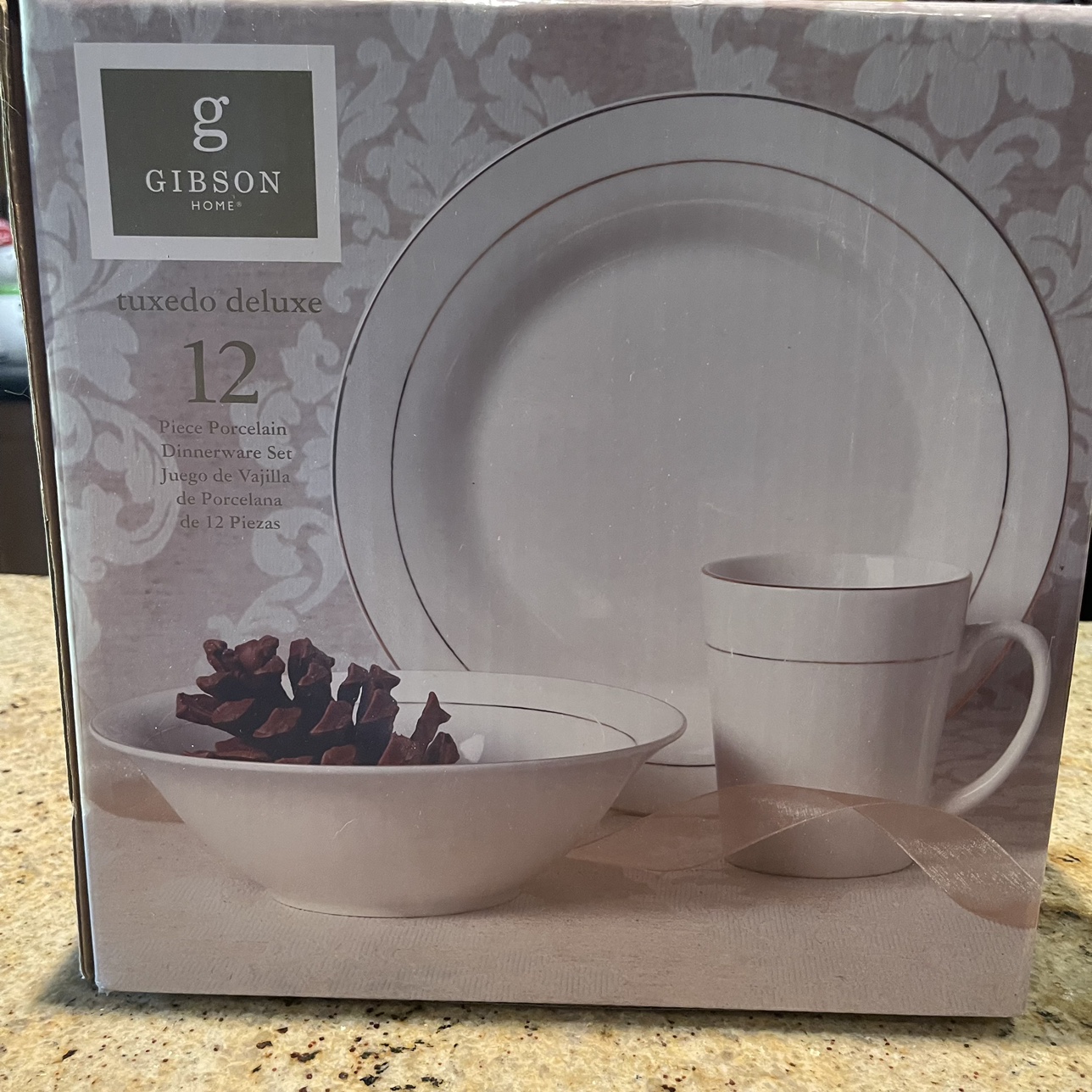 12 piece dinning set -  (never use) service for 4