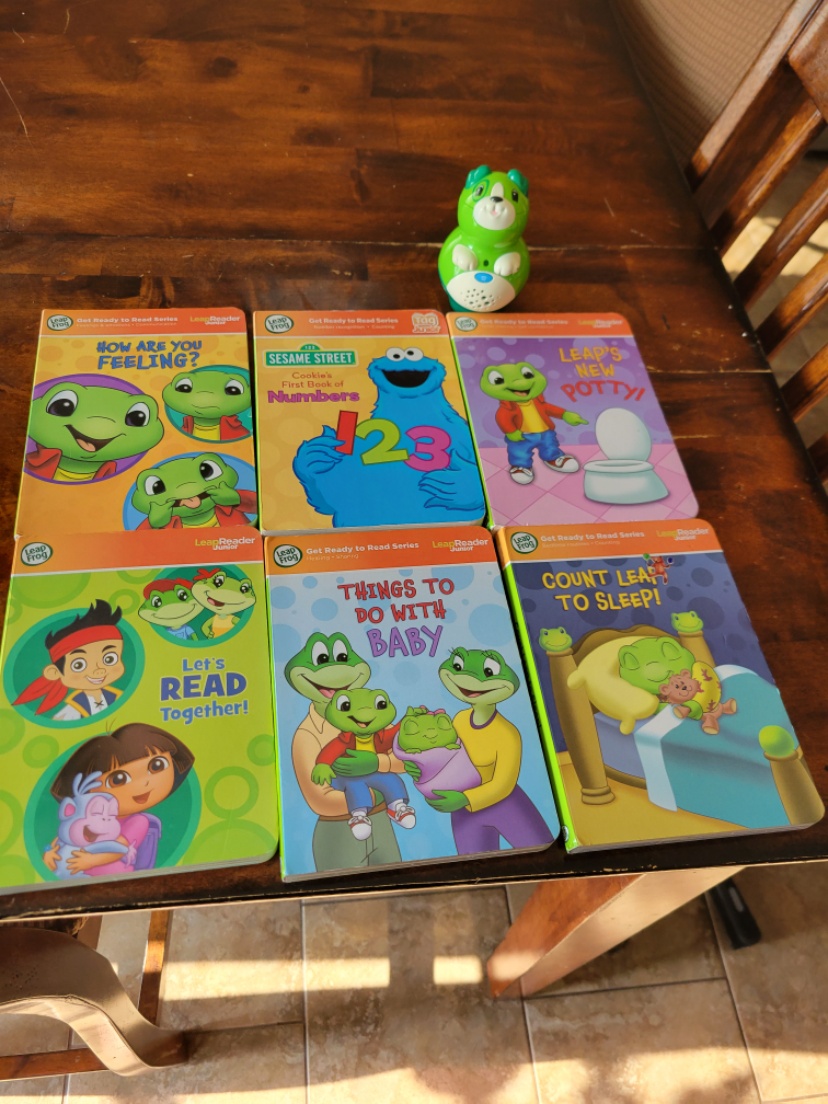 leapster reader and 6 books