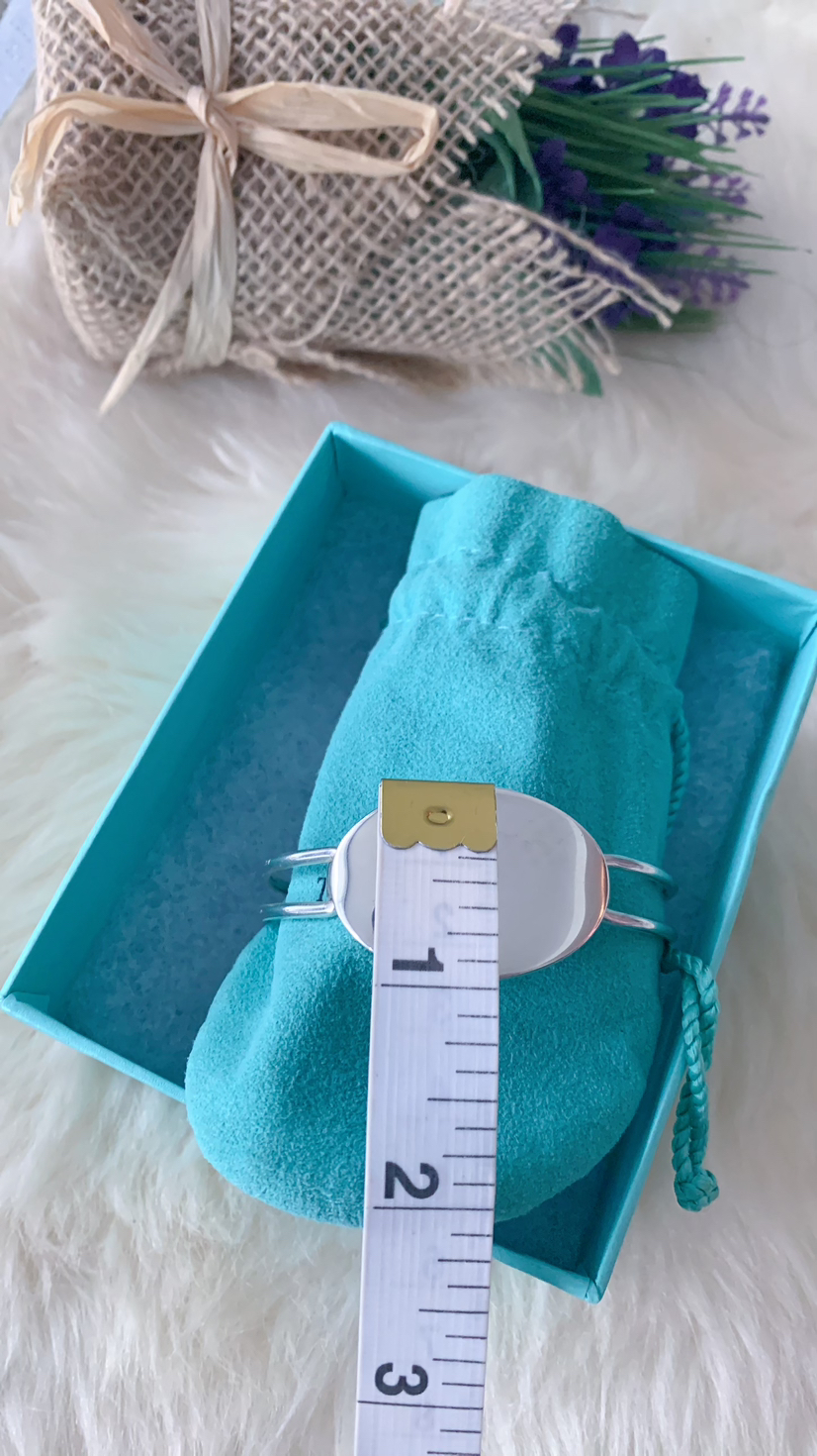 Tiffany & Co XL plain oval bangle bracelet image indicator(8)