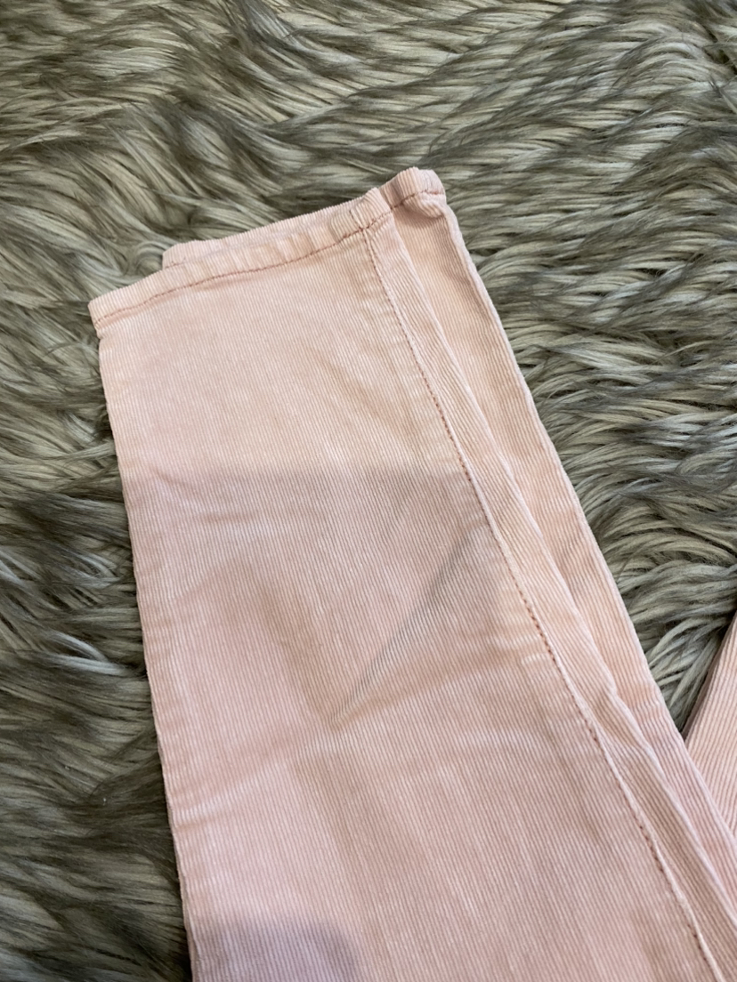 Pink corduroy pants. image indicator(3)