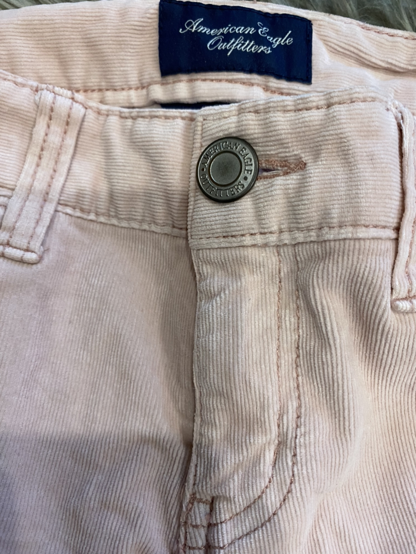 Pink corduroy pants. image indicator(9)