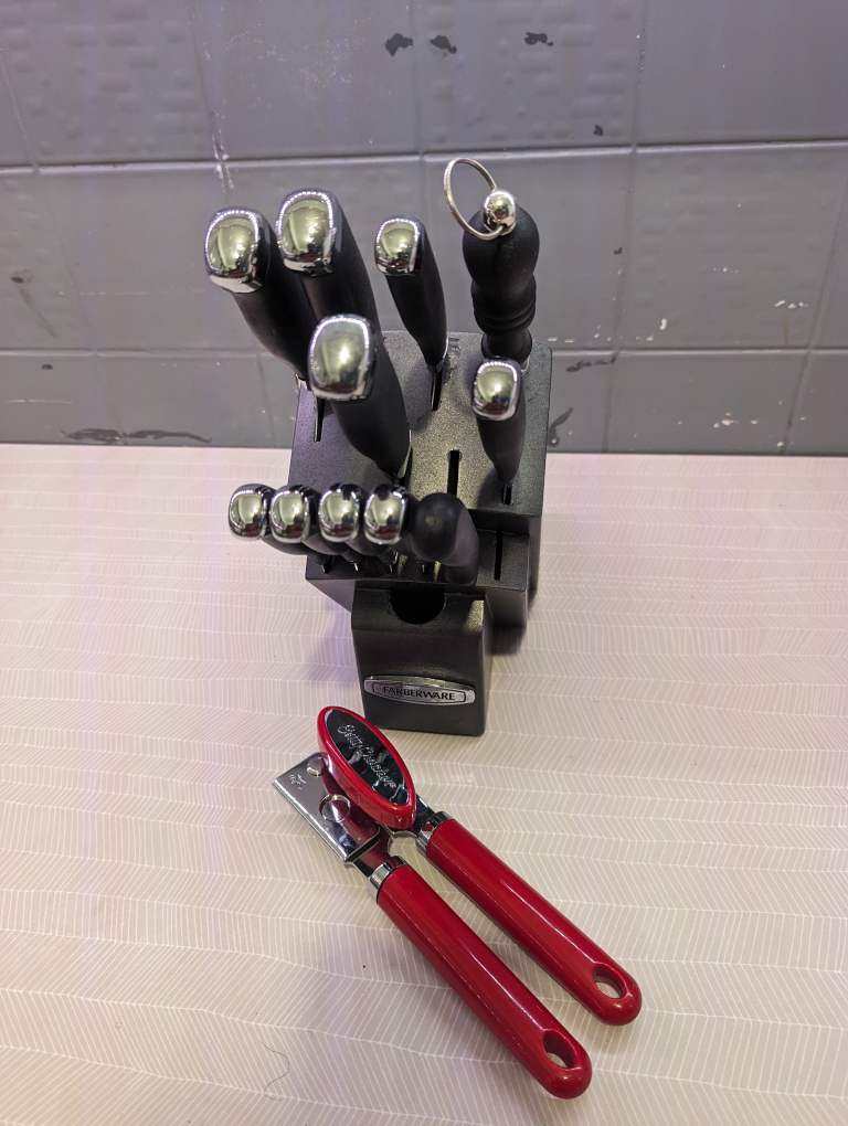 knife set & can opener, some rust some missing knives