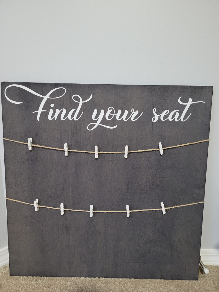 "Find your seat" sign