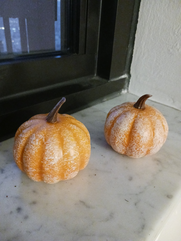 2 small plastic pumpkins