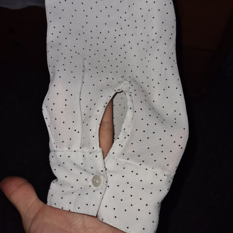 White blouse with black spots image indicator(3)