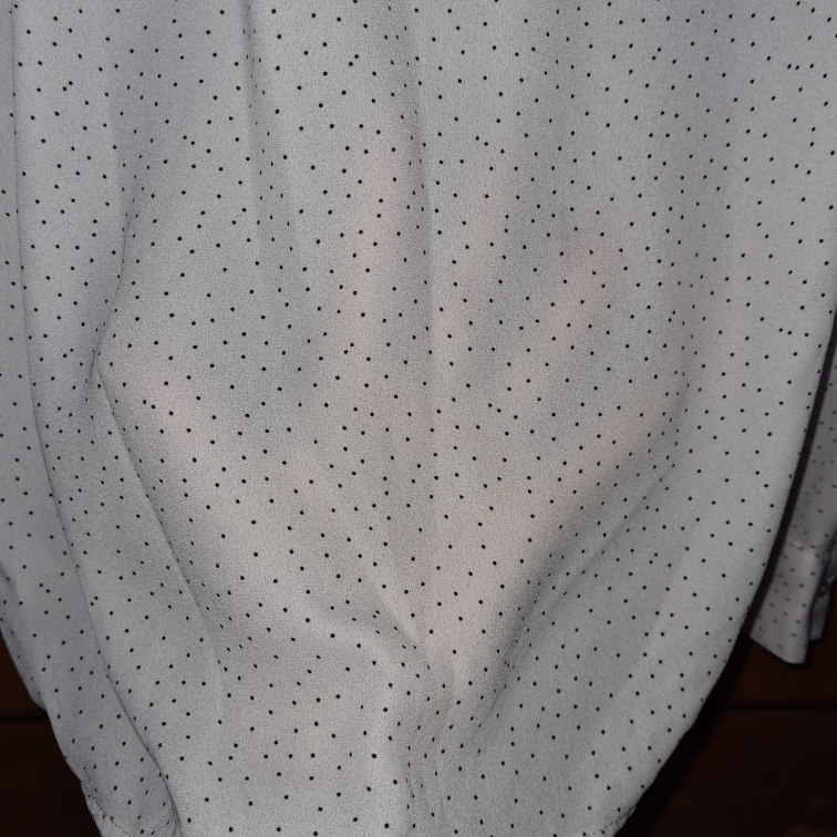 White blouse with black spots image indicator(5)