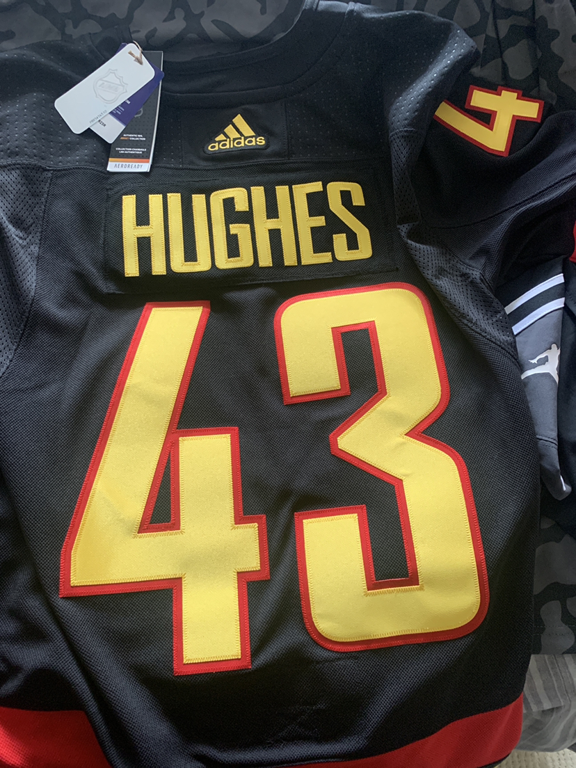 Canucks jersey flying skate Quinn Hughes