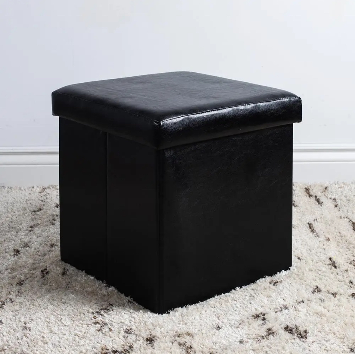Ottoman with storage and collapsible thumbnail