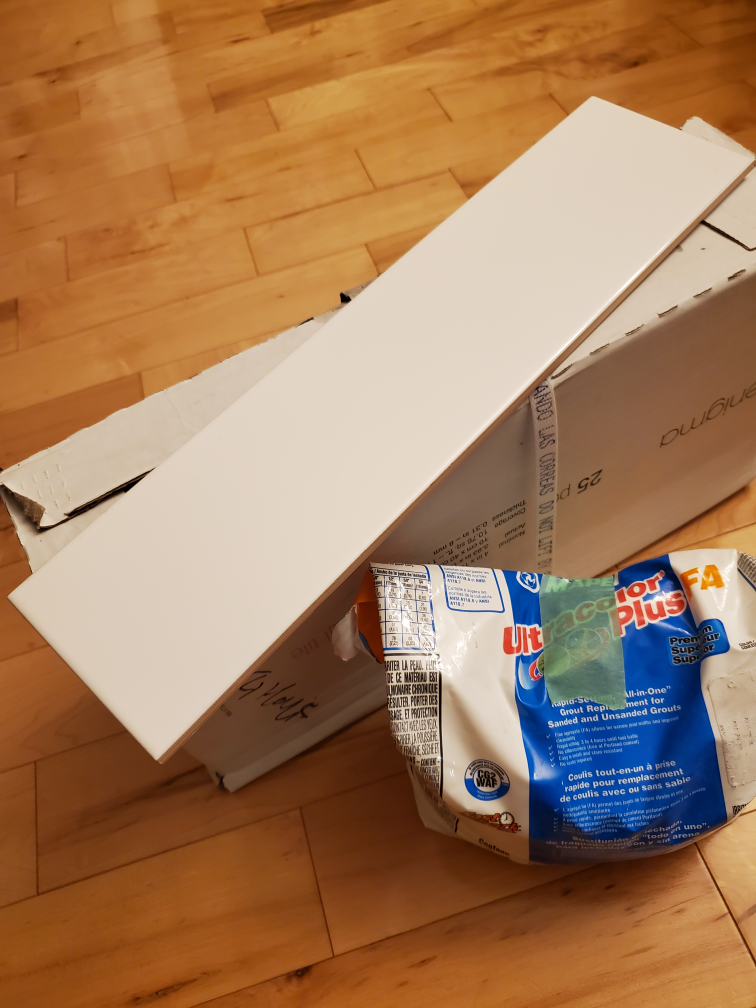 box of white large subway tile and white grout 🦃 thumbnail