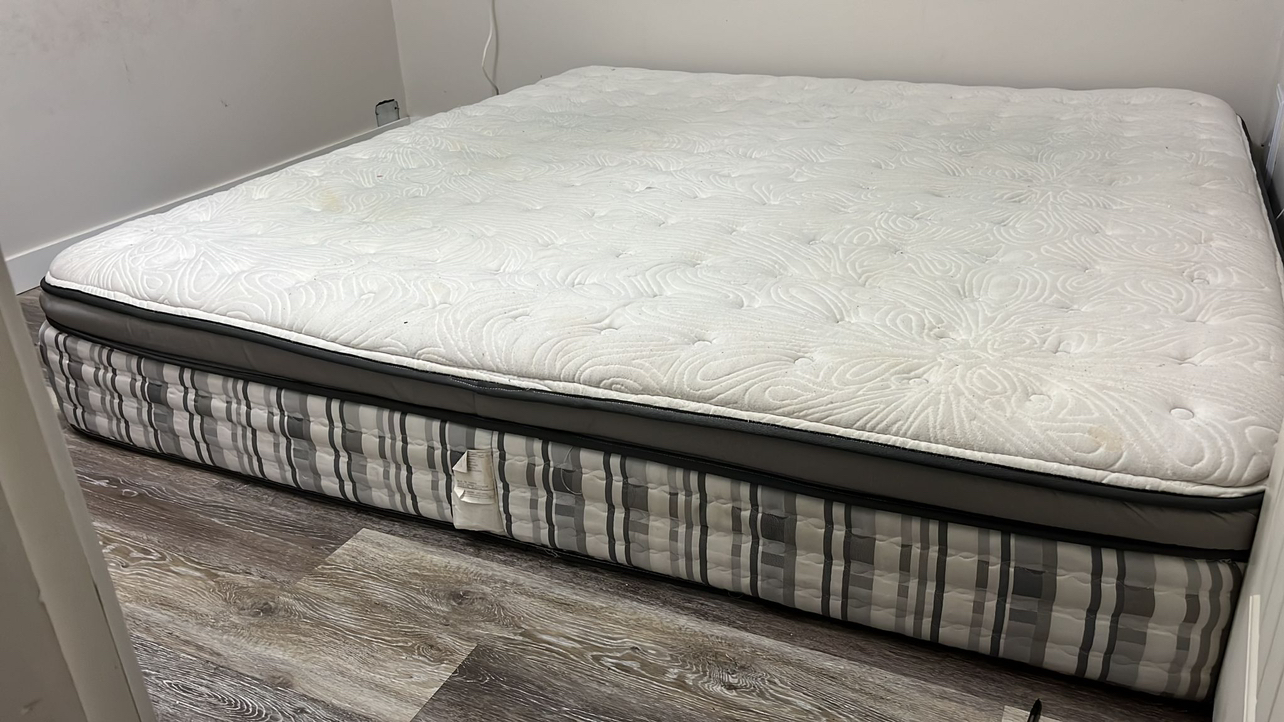 King size mattress with cover sheet