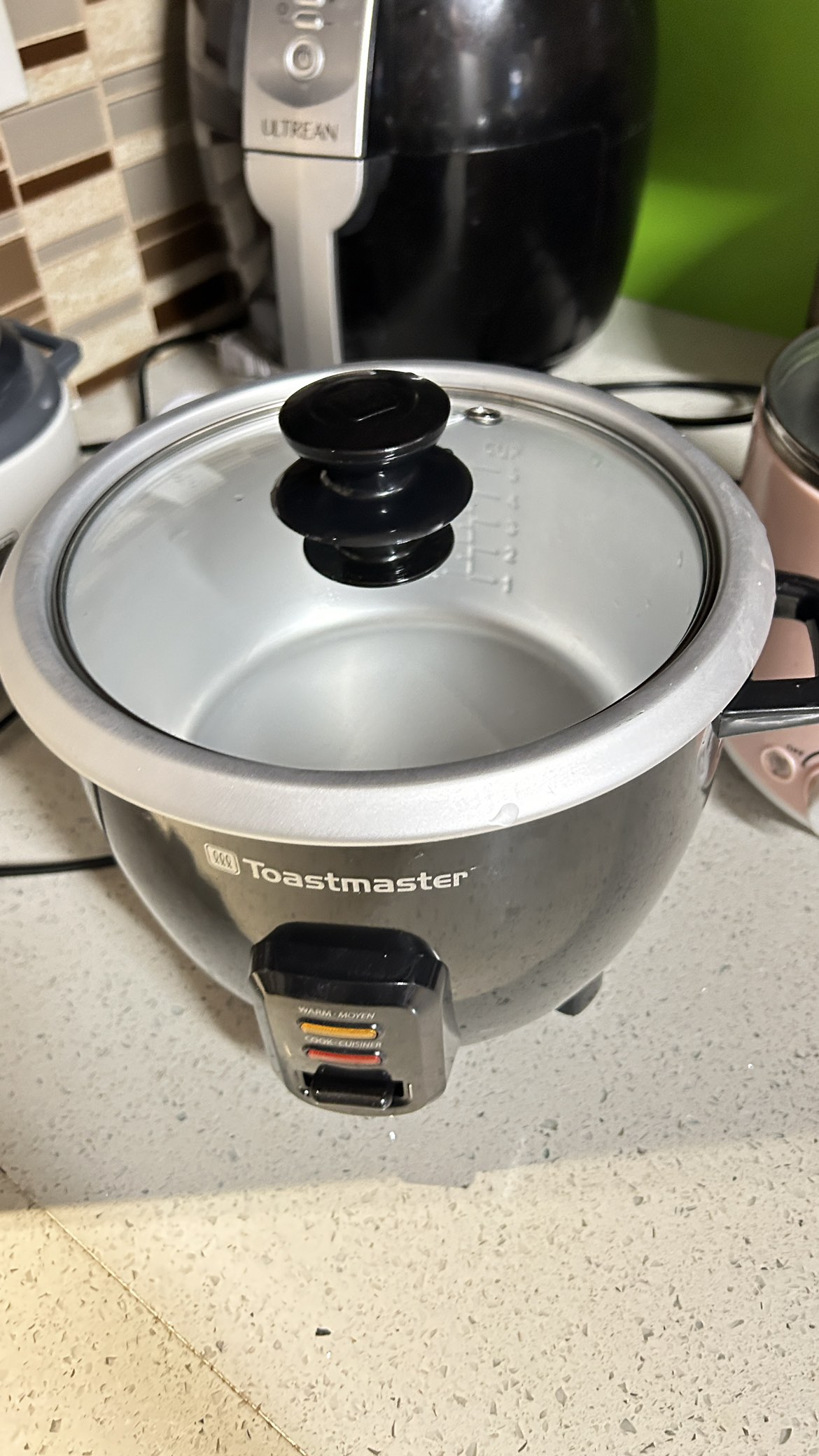 A cooker and a small pan