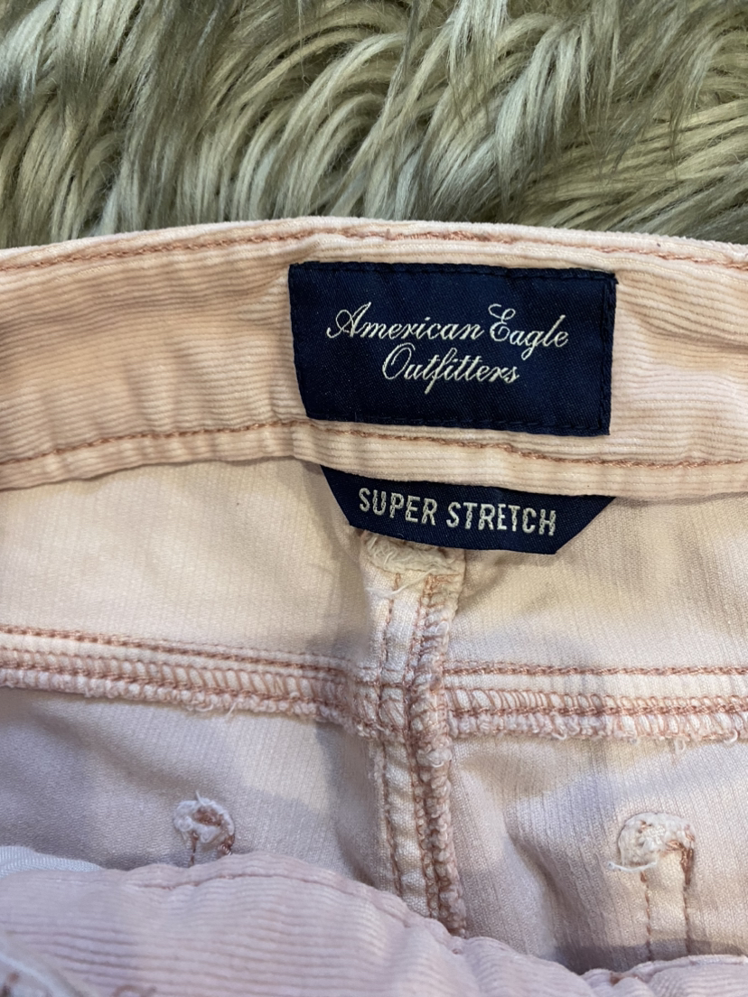 Pink corduroy pants. image indicator(4)