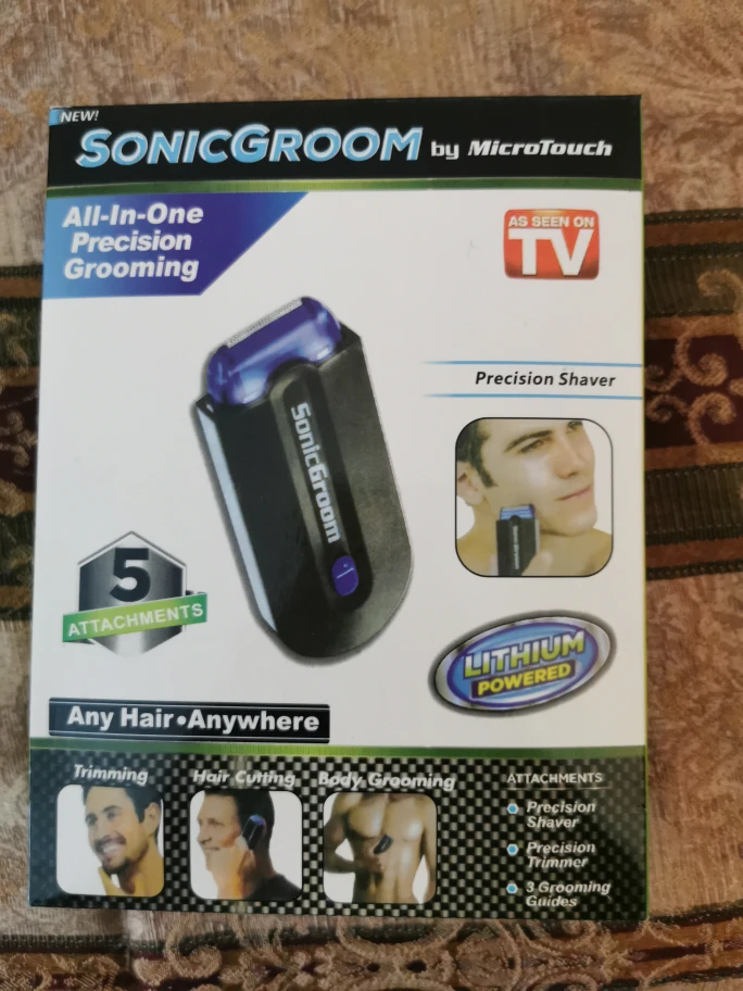 Sonic groom compact electric shaver