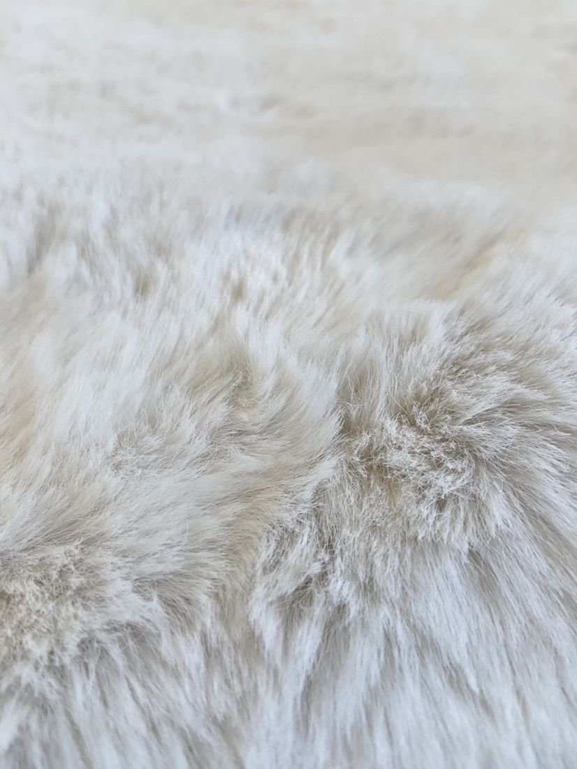 Brand New - Luxe faux fur rug 24” x 39” ivory image indicator(3)