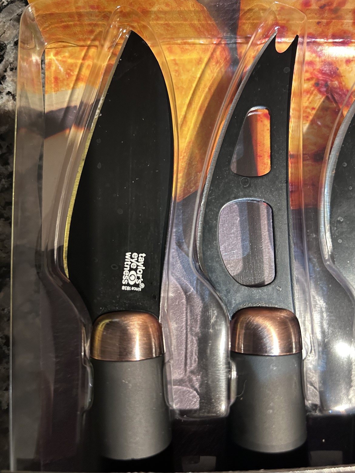 Cheese knife set. Stainless steel and black with copper handles image indicator(2)