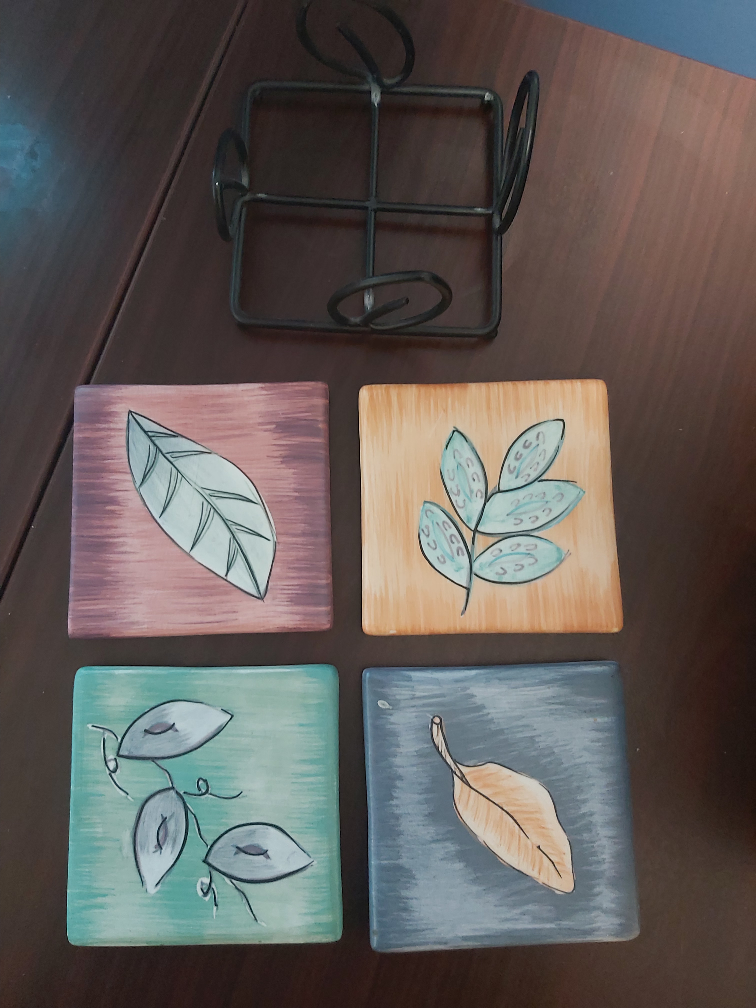 Ceramic coasters with stand.