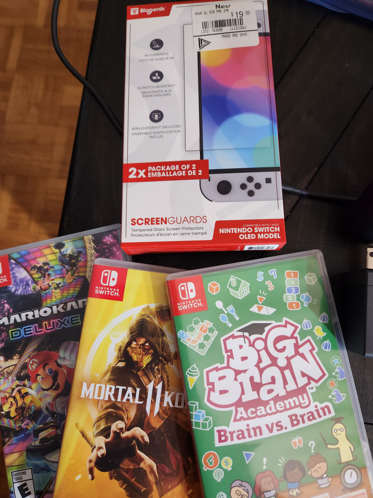 Nintendo Switch OLED + games - photo 2