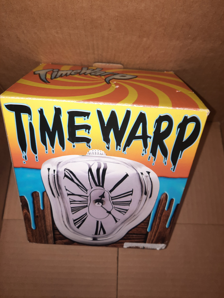 cool warped designed clock (placed on shelf) image indicator(3)