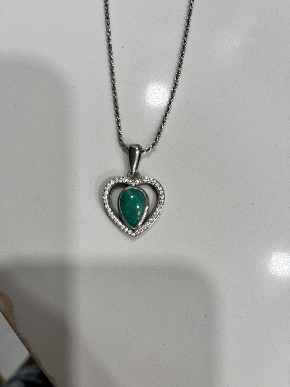 Floating heart emerald necklace