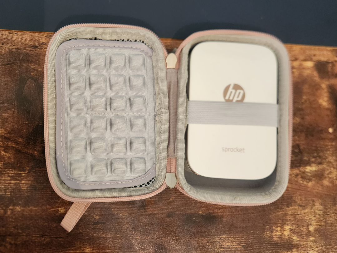 White HP Sprocket Portable Photo printer with paper and case image indicator(2)