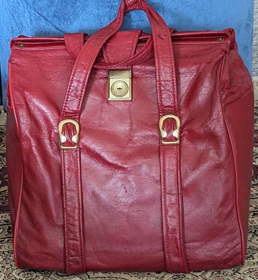 Large, deep, red, travel bag