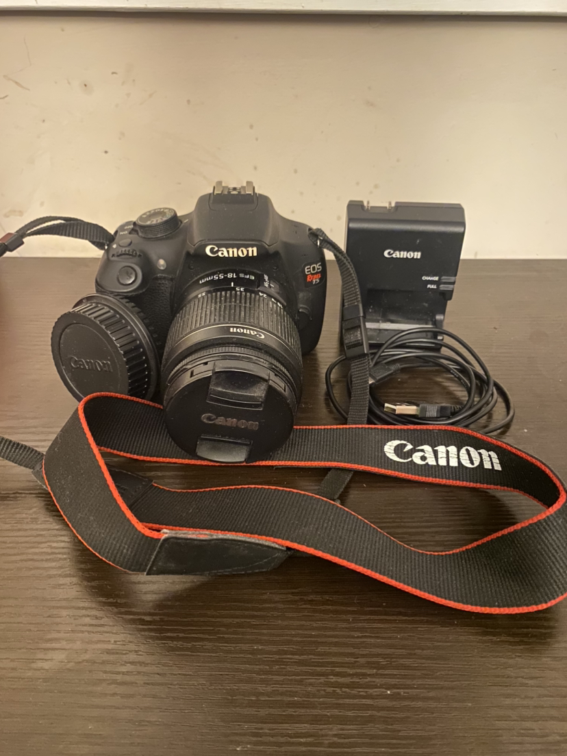 Cannon Rebel T5 with cannon zoom lens EF-S 18-55mm