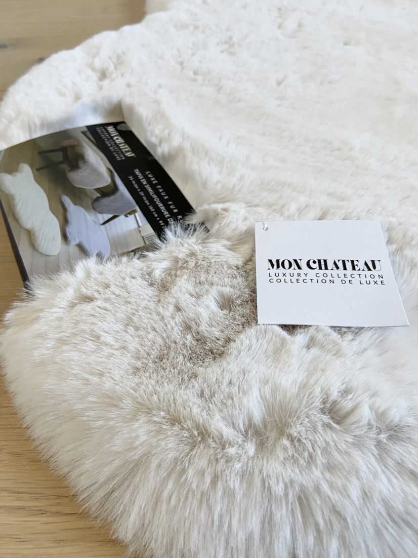 Brand New - Luxe faux fur rug 24” x 39” ivory image indicator(2)