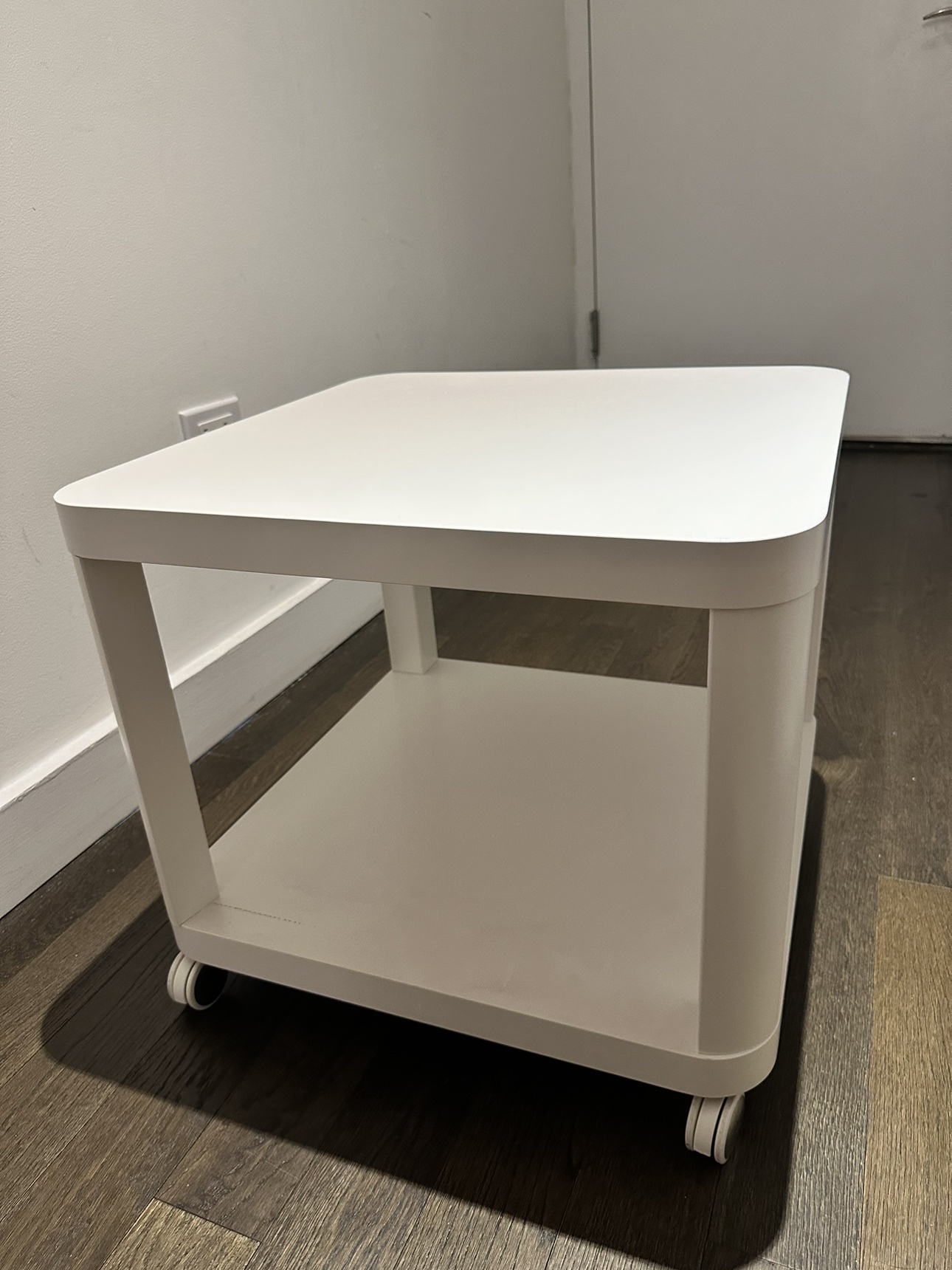 Mini white rolling side table with wheels IKEA