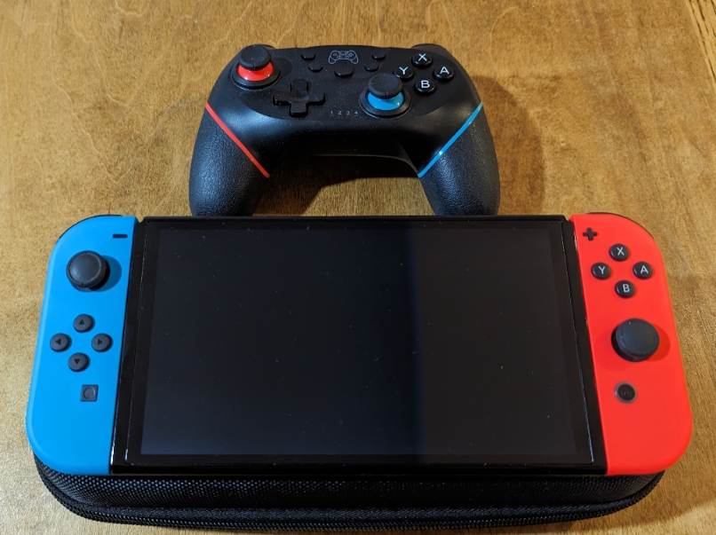 Nintendo Switch OLED Bundle - photo 2