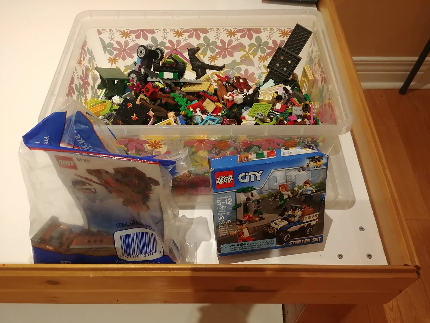 Box of Lego pieces thumbnail