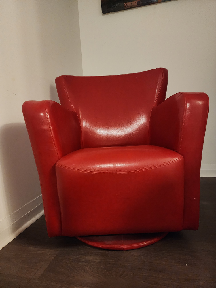 Red Leather swivel sofa