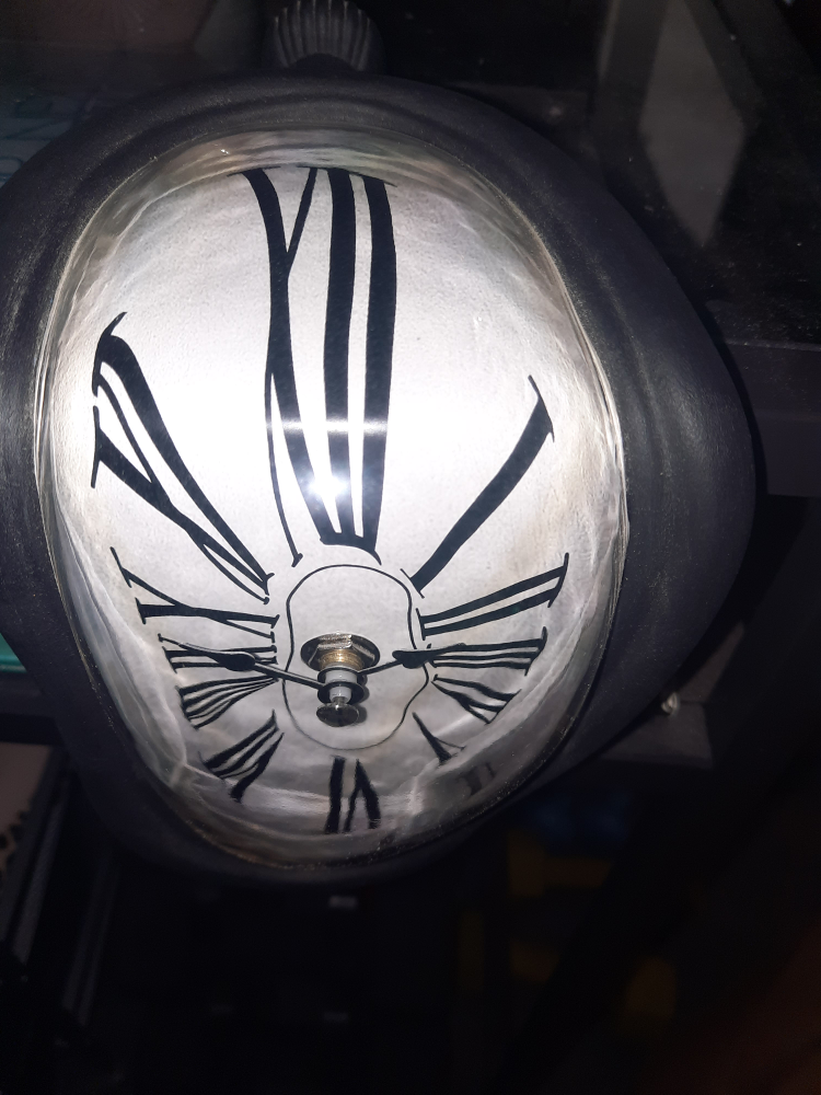 cool warped designed clock (placed on shelf) image indicator(2)