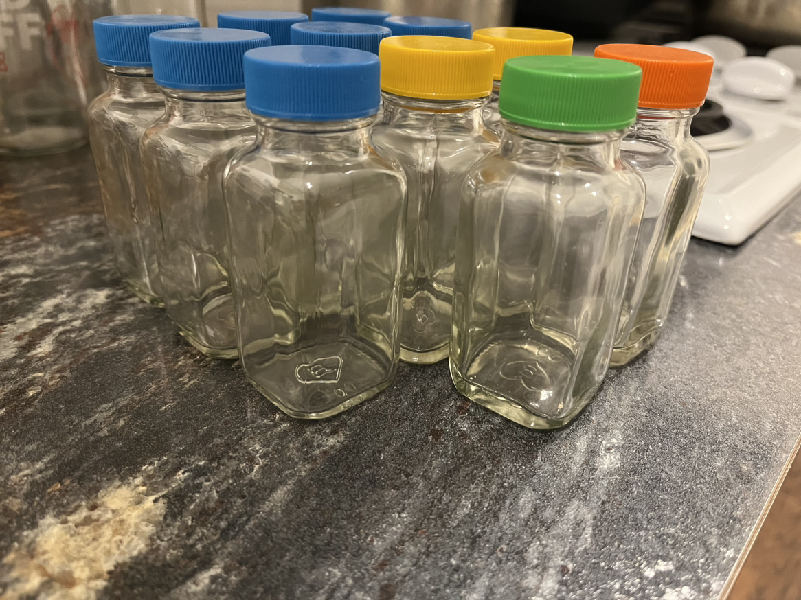 11 tiny Glass Bottles
