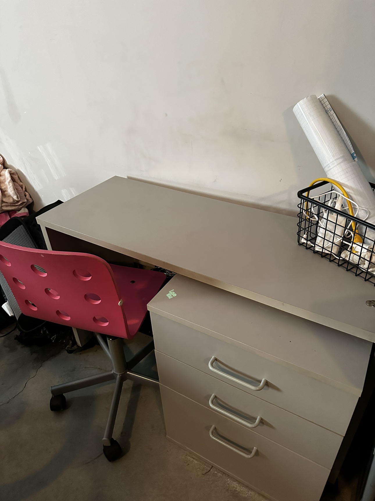 Desk with chair and drawers.
