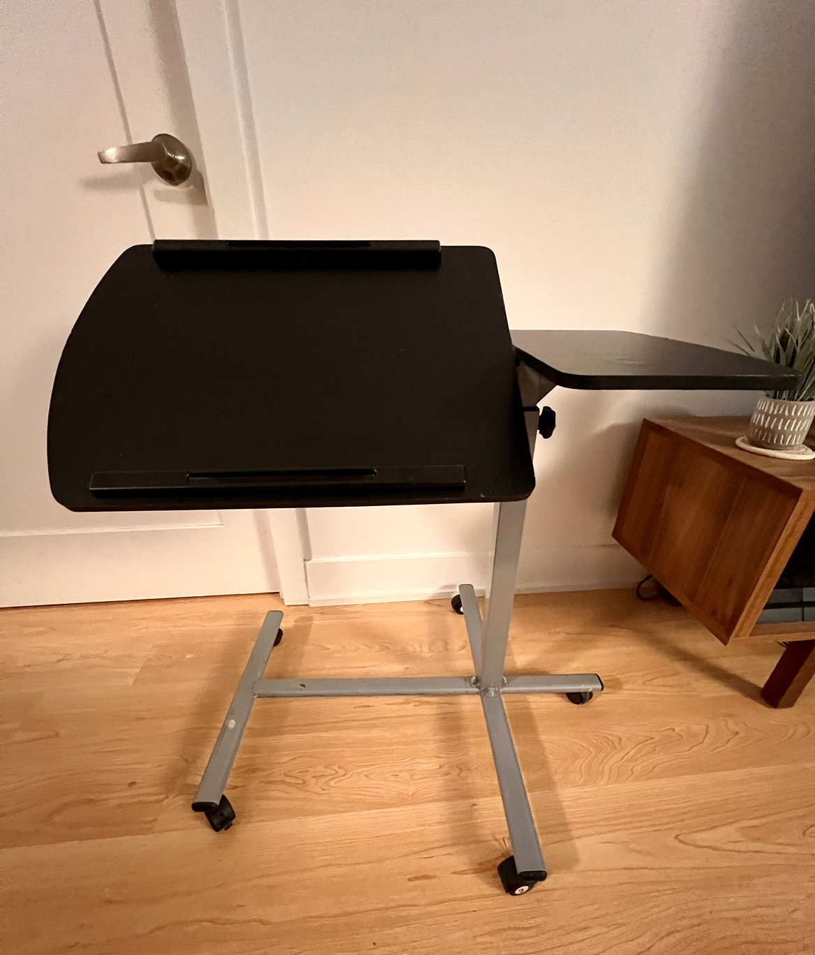 Adjustable table for laptop/work/snacks or side table